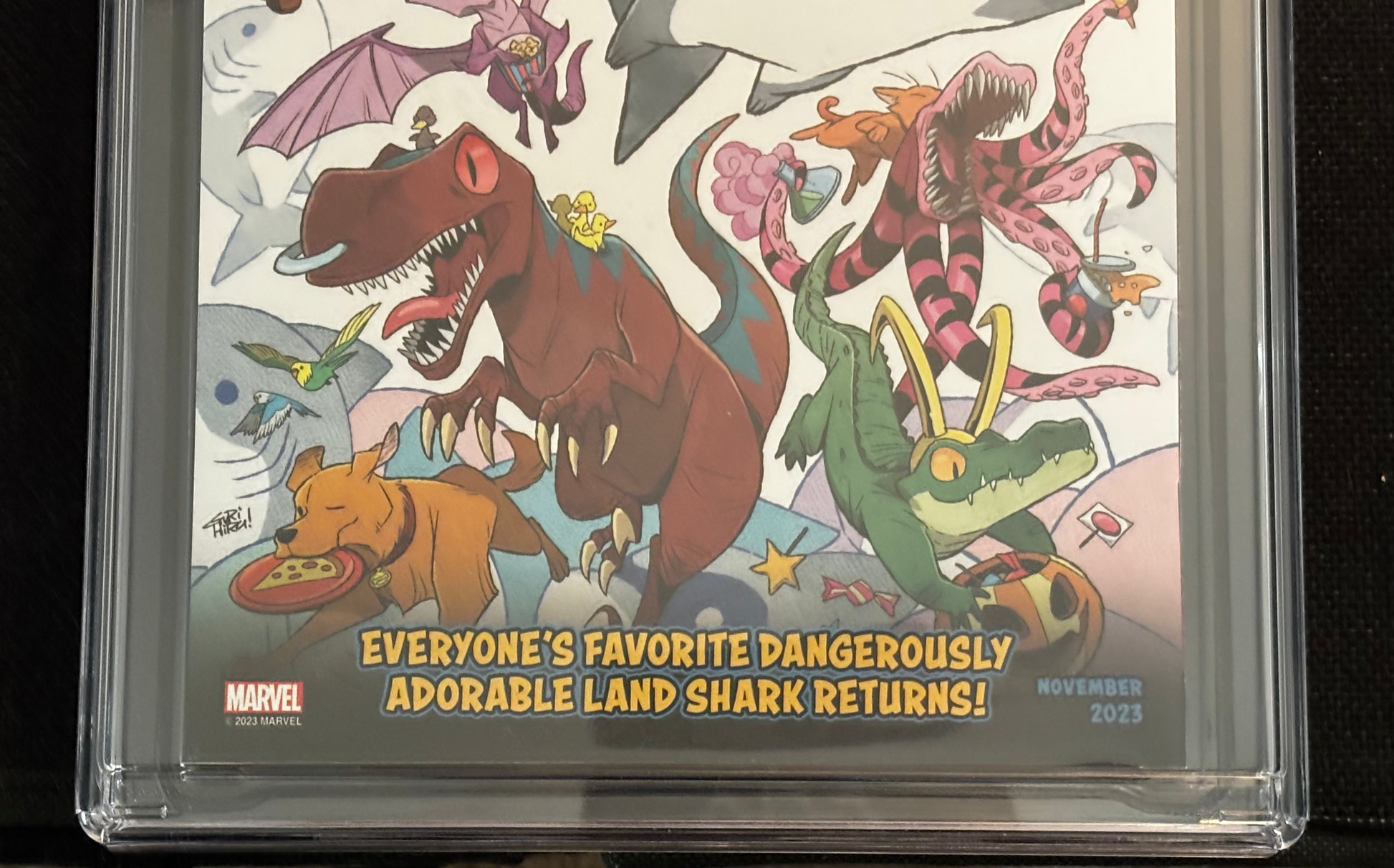 Comic book with colorful illustrations of various creatures on a black background